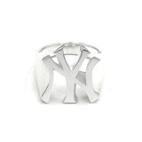 A silver-toned metal ring featuring a large, openwork interlocking 'NY' logo design, photographed on a seamless white background.