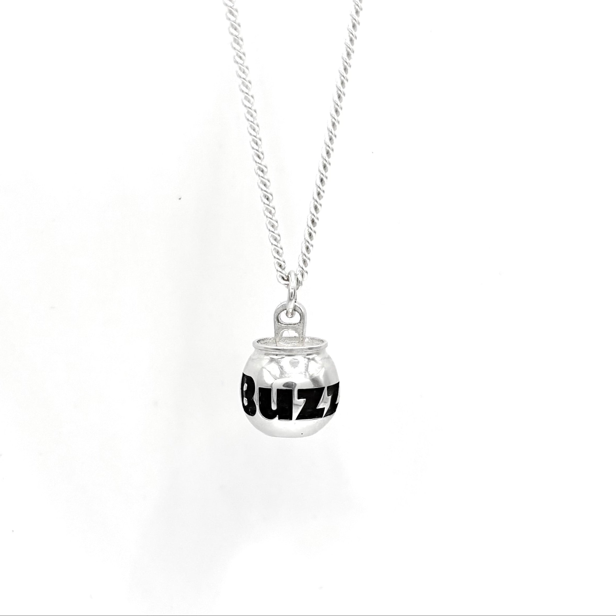 A silver chain necklace with a small cocktail can pendant featuring the word 'BuzzBallz' printed in bold black letters, shown against a plain white background.